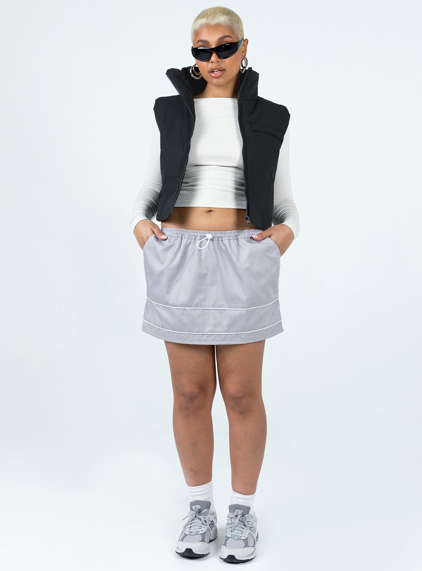 Black puffer vest High neck Zip front fastening  Faux chest pocket 