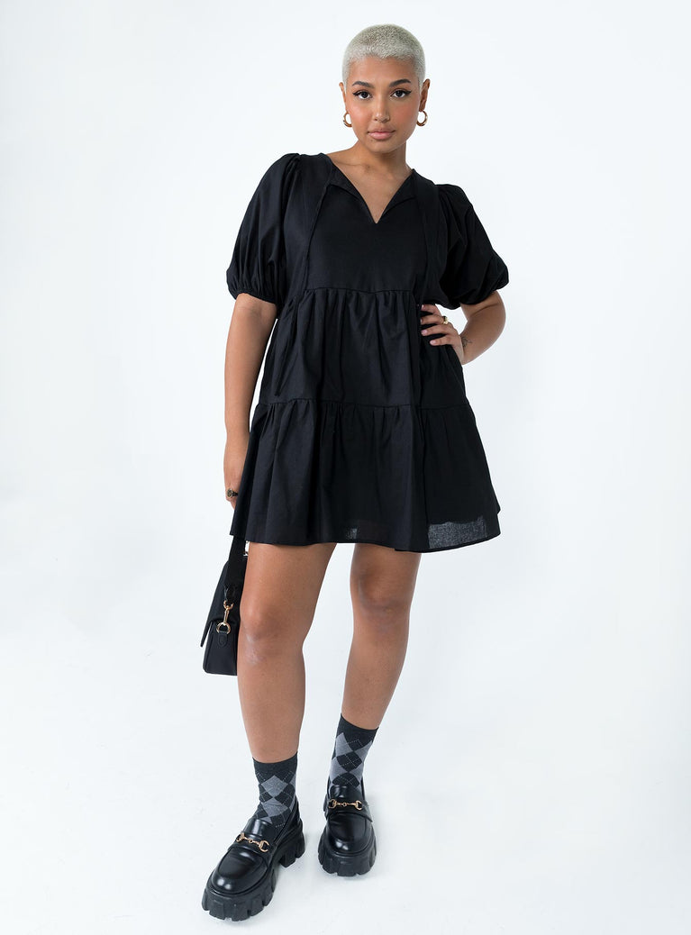 front view of model wearing Princess Polly Braxton Mini Dress Black V-Neck 