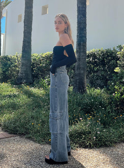 Front view of model wearing  front Princess Polly Low Rise Jeans  Randle Cargo Jeans Mid Wash Denim