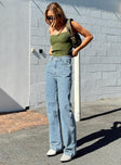 Front view of model wearing  front Princess Polly High Waisted  Morala Wide Leg Cargo Jeans Mid Wash Denim