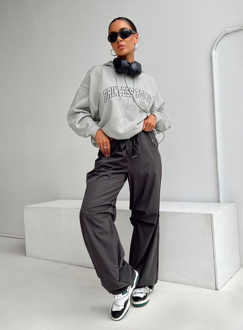 front view of model wearing Princess Polly Princess Polly Hooded Sweatshirt Collegiate Text Grey / Green 