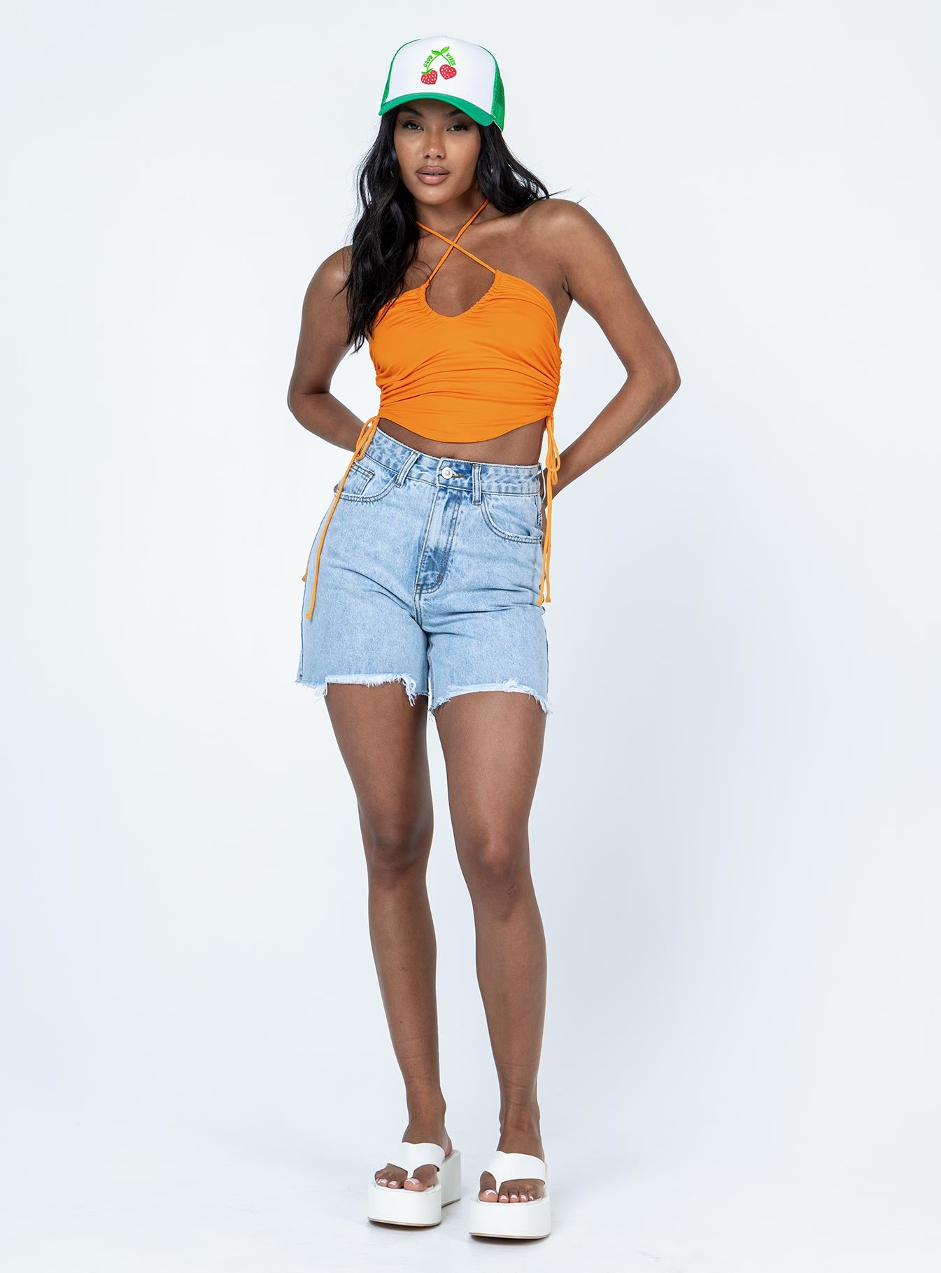 front view of model wearing Princess Polly Jenson Top Orange Sleeveless Asymmetric Neckline 
