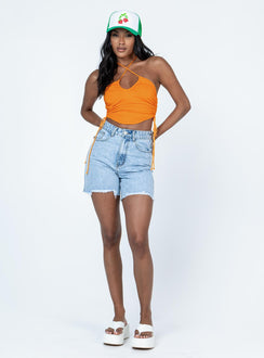 front view of model wearing Princess Polly Jenson Top Orange Sleeveless Asymmetric Neckline 