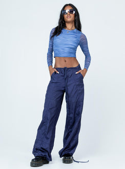 front view of model wearing Princess Polly Knox Top Blue Full Sleeves Crew Neck 