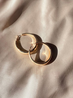 Earrings Gold toned Latch fastening Oversized hoop design