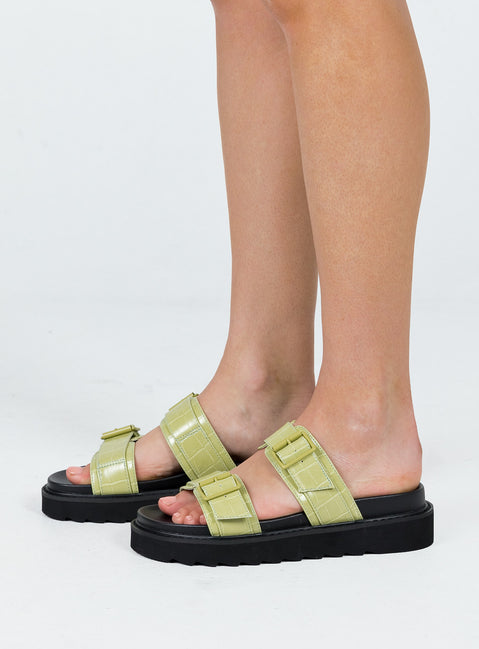 Black and green sandals Double upper strap Both adjustable Chunky treaded sole Padded footbed