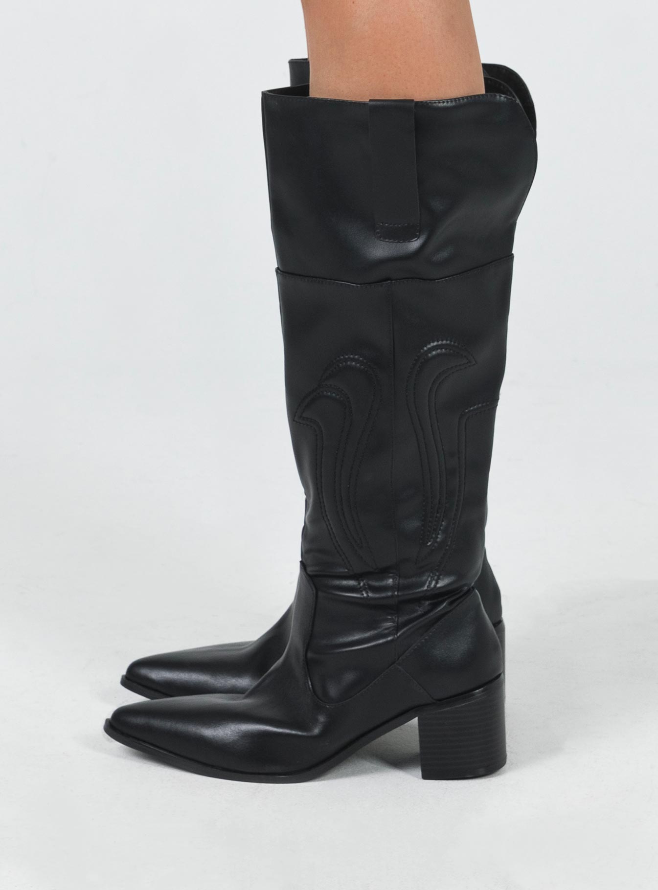 Knee high boots Faux leather material Stitched detail Pull tabs at side Pointed toe  Padded footbed