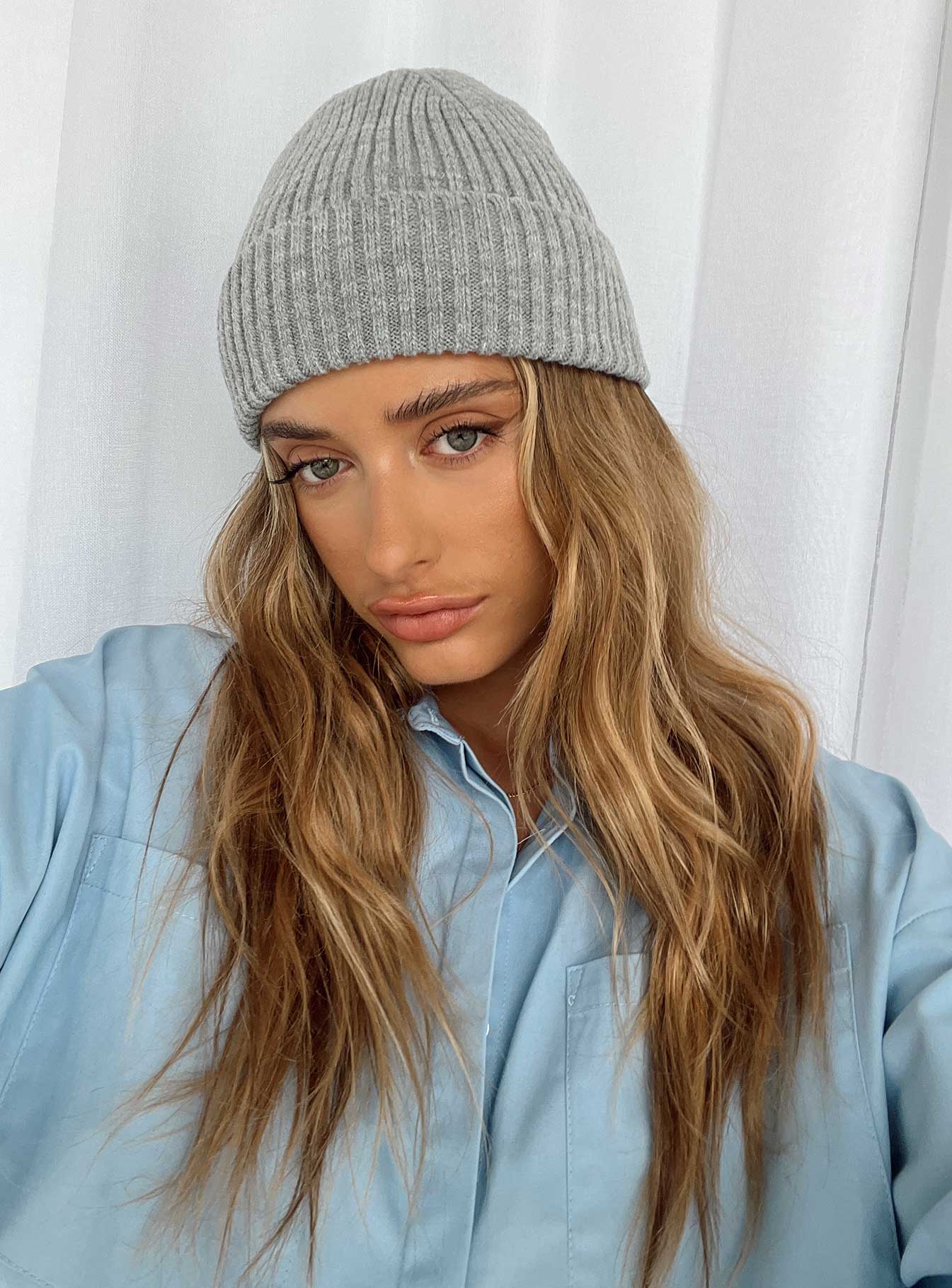 Knit beanie Foldable brim Thick knit material Pinched top Double lined