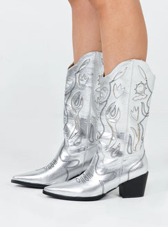 Cowgirl boots  Princess Polly Exclusive Upper 100% PU  Lining & insock 100% textile  Outsole 100% TPU  Metallic material Mid-calf length  Rounded hem  Pointed toe  Detail stitching 