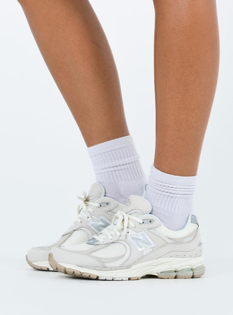 Sneakers  Faux suede and mesh material  Lace up style  Platform base Padded inner  Treaded sole 