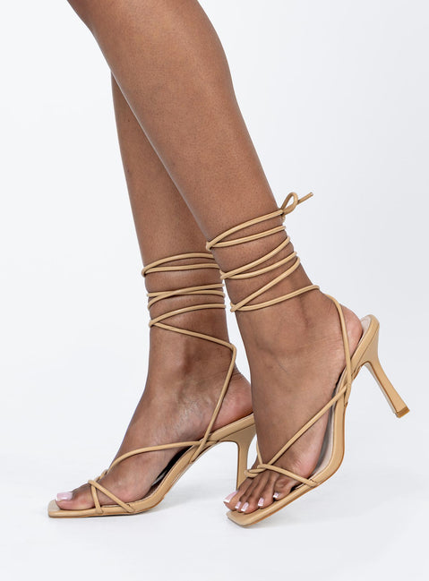 Heels Faux leather material  Strappy upper  Ankle wrap tie fastening Square toe  Stiletto heel 