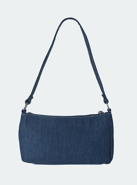Shoulder bag Dark wash denim material Fixed shoulder strap Zip fastening Silver toned hardware External and internal slip pockets