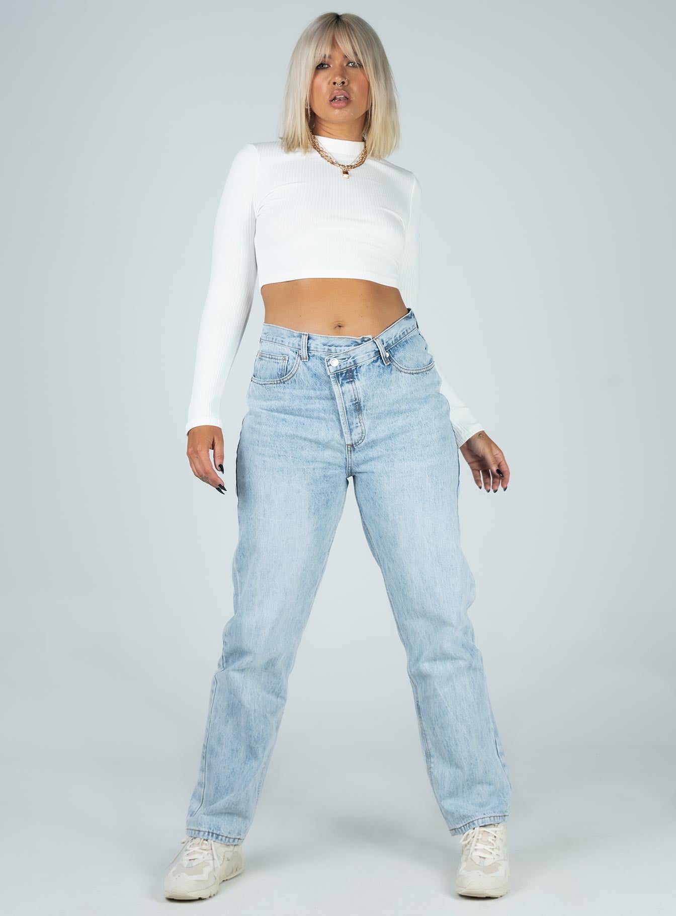 Front view of model wearing  front Princess Polly Full Sleeves Square Neck  Cora Long Sleeve Top