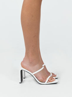 Heels Faux patent leather  Strappy upper  Shaved block heel Square toe 