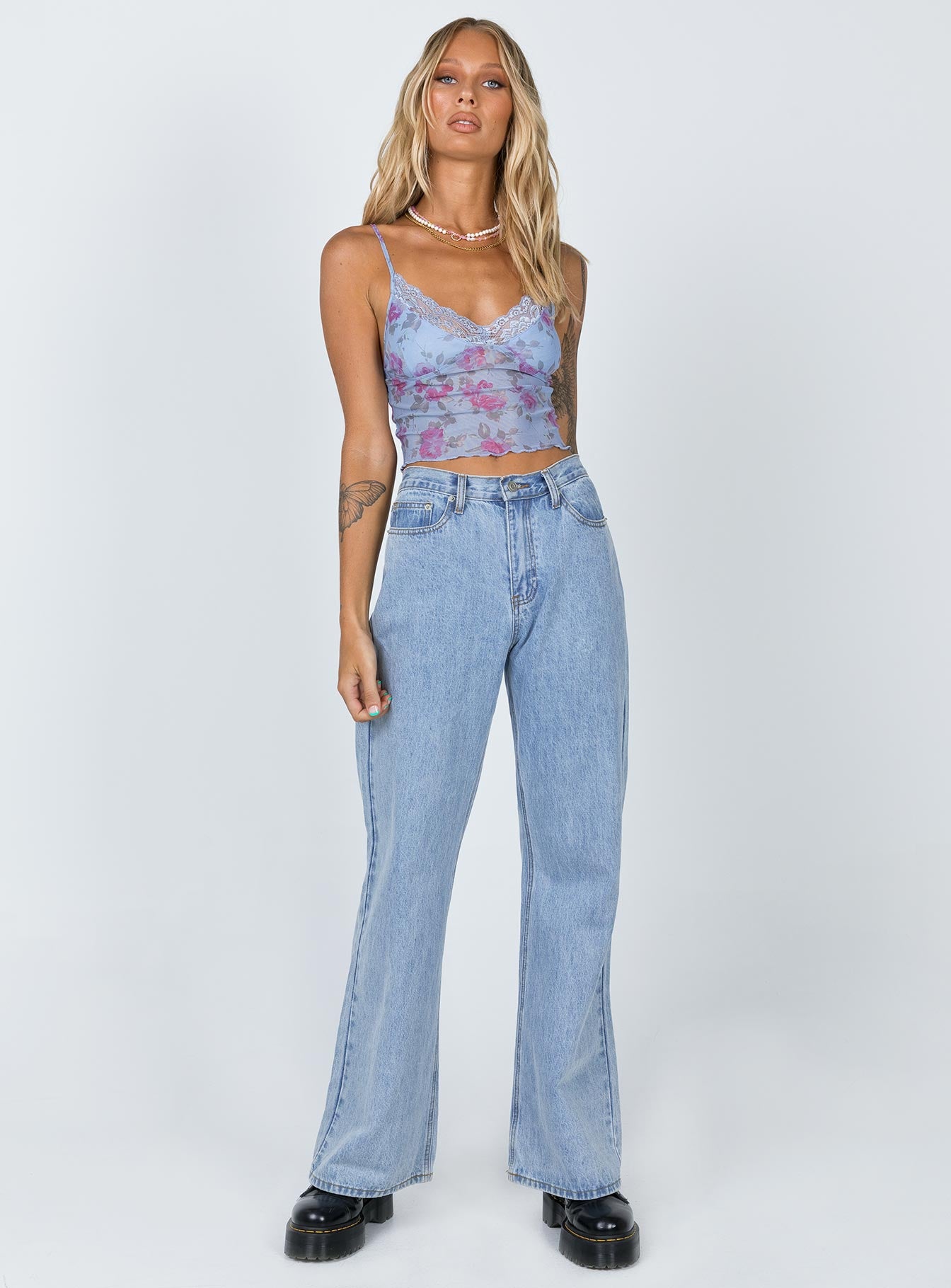 side view of model wearing Princess Polly Motel Yenika Top Rosa Powder Blue 