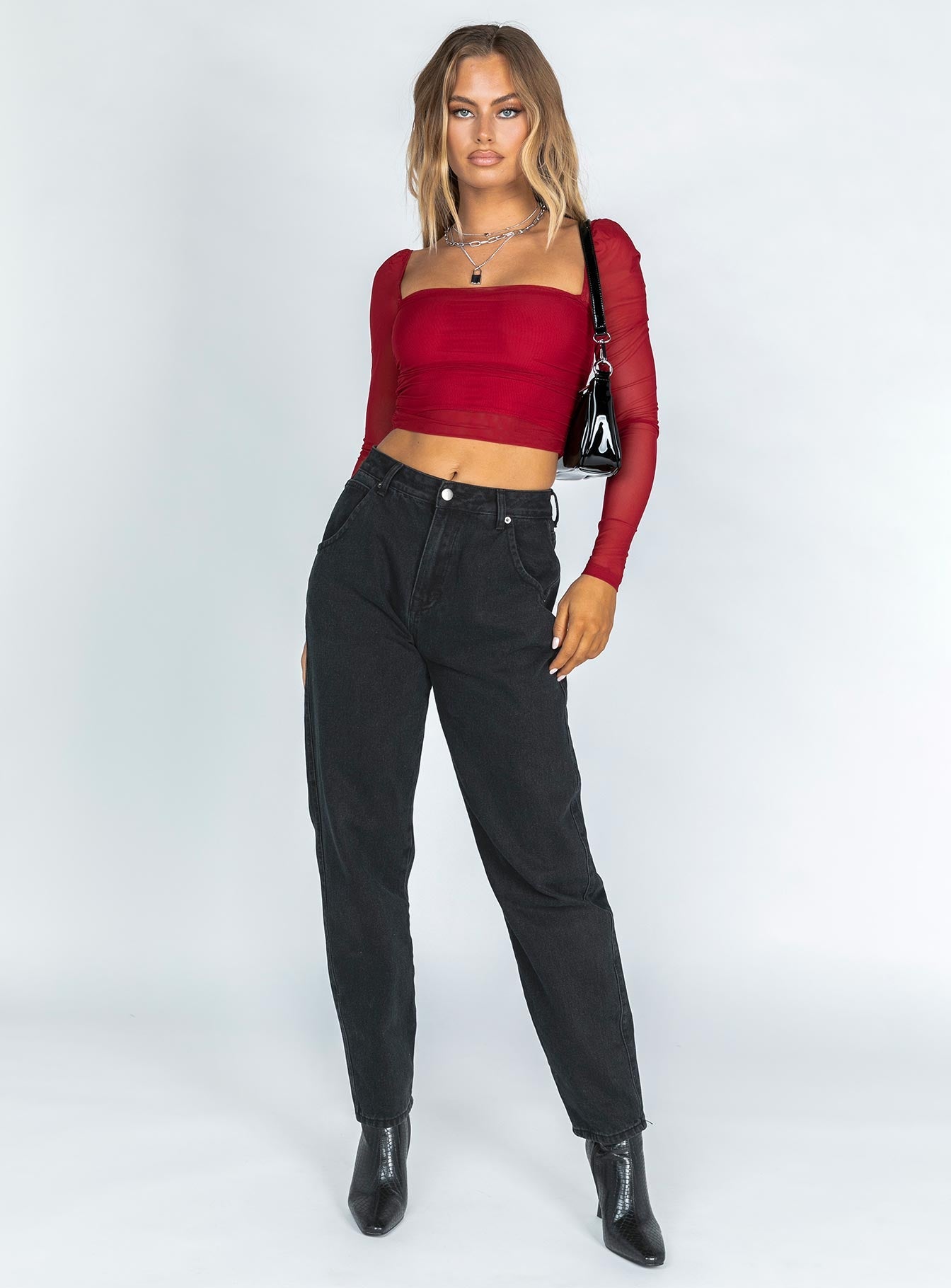 front view of model wearing Princess Polly City Lights Long Sleeve Top Red 