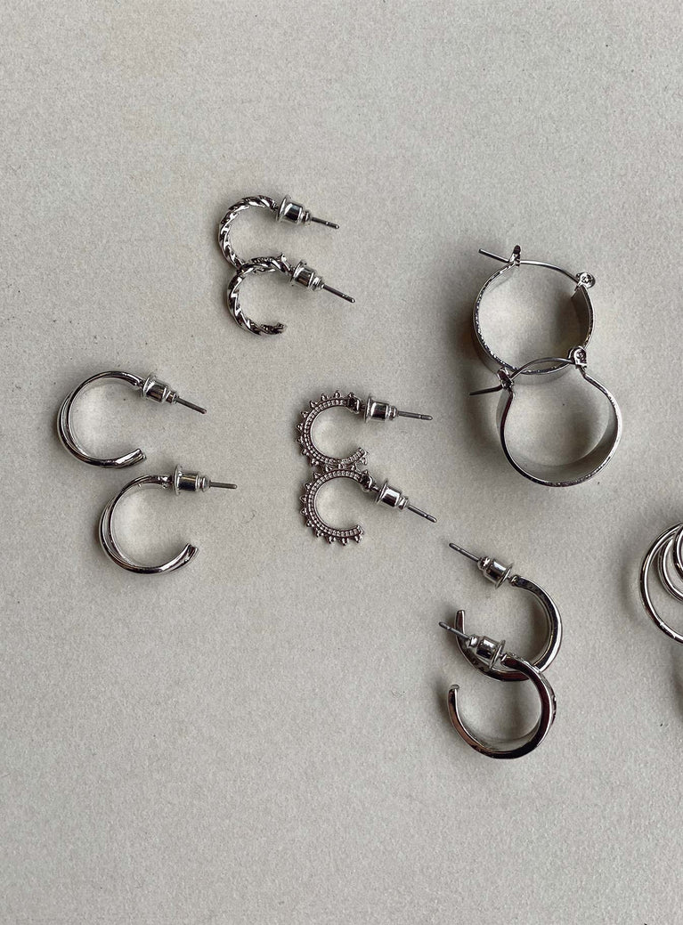 Earrings Pack of six styles All hoop design Stud fastening Silver-toned Each style differs