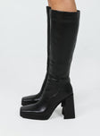 Knee high boots Faux matte leather Platform base Squared toe Thick flared heel Zip fastening at side