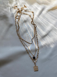 Necklace pack  Princess Polly Exclusive 50% brass 30% steel 15% zinc alloy 5% glass Pack of three  Single chain with pendant  Layered chain - these can not be worn separately  Lobster clasp fastening  Gold-toned 