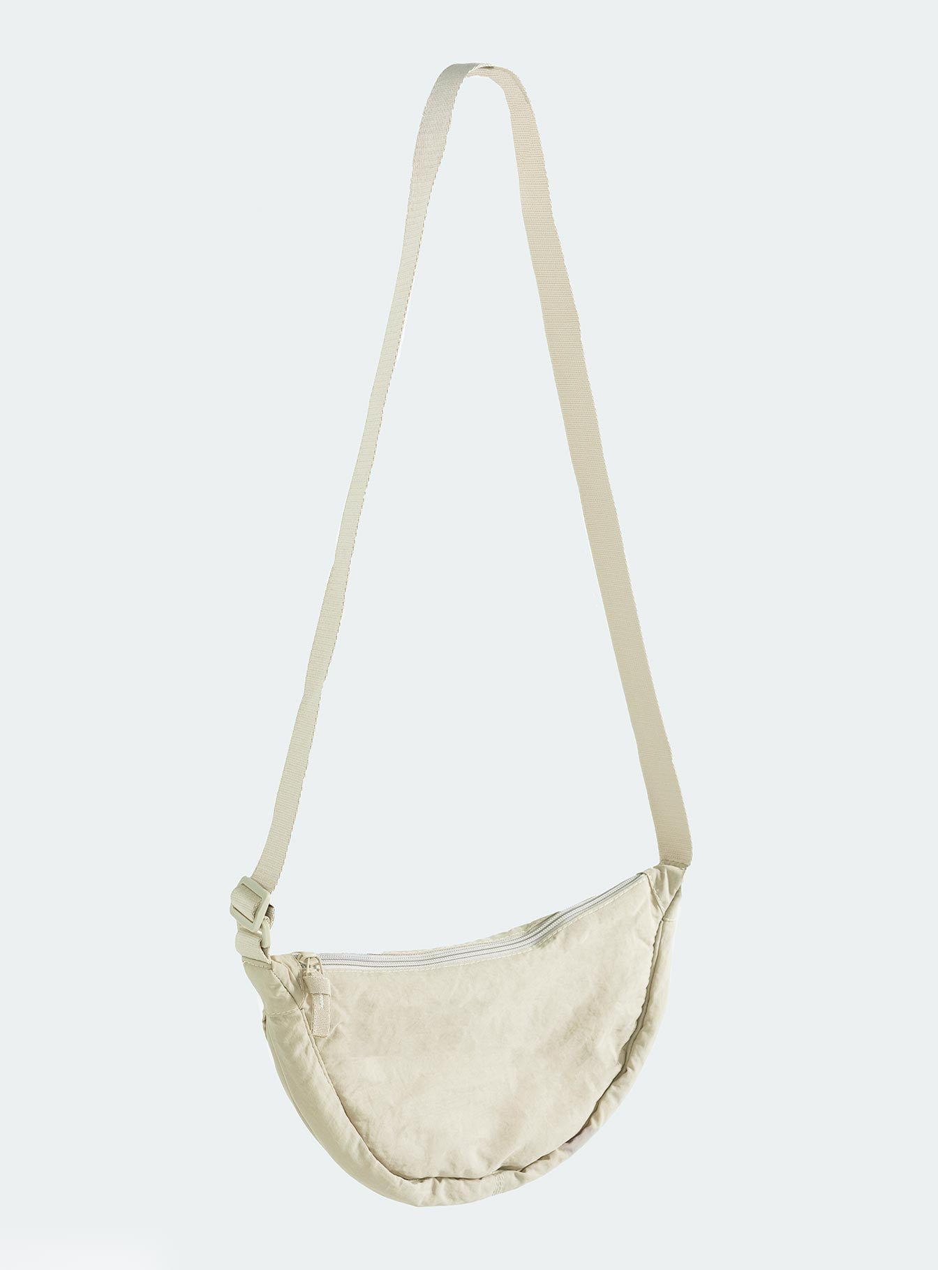 Crossbody bag Adjustable crossbody strap Zip fastening Internal card slip