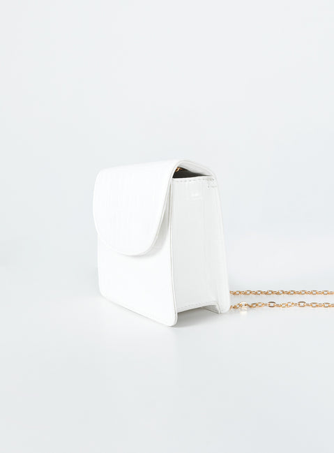 Crossbody bag  Princess Polly Exclusive 100% PU  Faux leather material  Croc print Gold-toned chain strap  Magnetic button fastening  Flat base