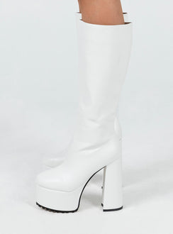 Platform boots Faux leather material Knee-high Zip fastening at side Block heel Rounded toe Treaded sole