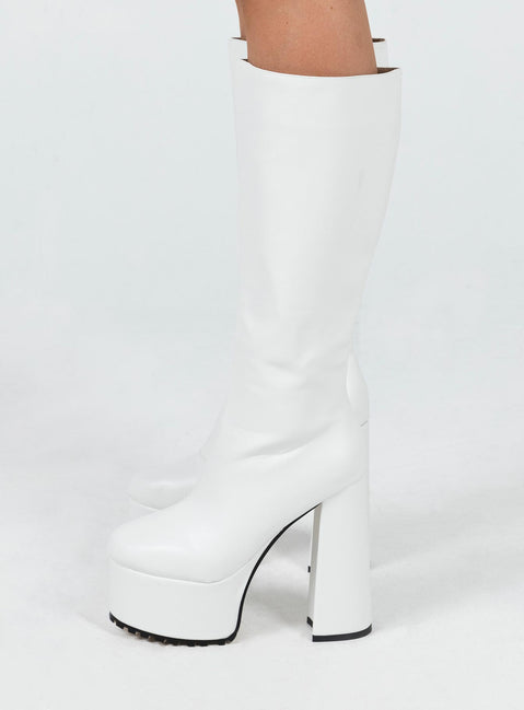 Platform boots Faux leather material Knee-high Zip fastening at side Block heel Rounded toe Treaded sole