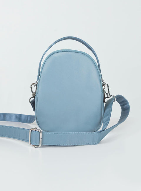 Crossbody bag Nylon material Fixed handle Adjustable & removable crossbody strap Three seperate compartments Zip fastenings Silver-toned hardware