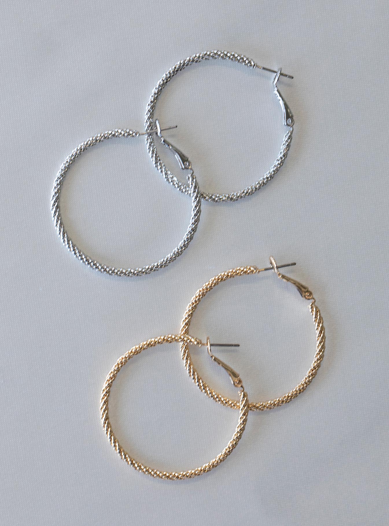 Earring pack Pack of four Silver & gold-toned Hoop style Latch back fastening