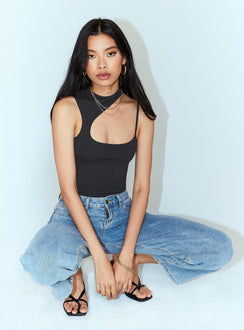 side view of model wearing Princess Polly Molly Asymmetric Bodysuit Black Sleeveless 