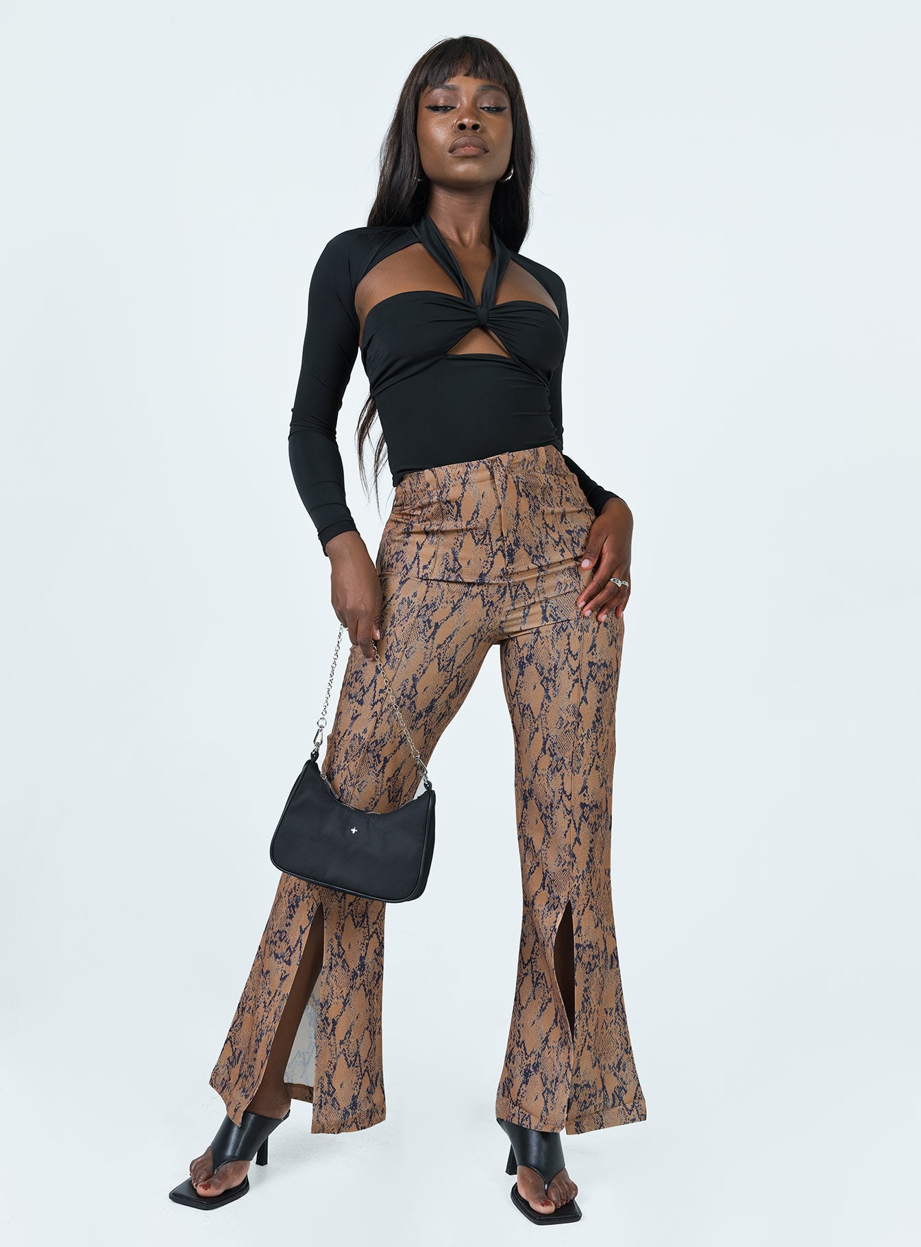 front view of model wearing Princess Polly Devotion Snake Print Pants Brown 