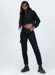 back view of model wearing Princess Polly Attica Knee Rip Denim Jeans Black Mid Rise 