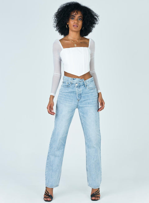 Front view of model wearing  front Princess Polly Short Sleeves Square Neck  Beverly Long Sleeve Top White