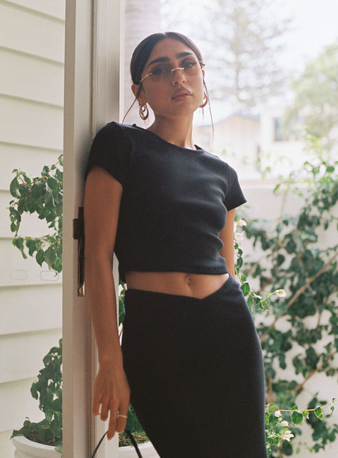 Front view of model wearing  front Princess Polly Short Sleeves High Neck  Classic Crop Tee Black