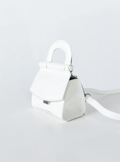 Mini bag  95% PU 5% zinc Faux patent leather  Single handle  Adjustable crossbody strap  Flat base 