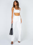 Matching set Crop top Fixed straps Invisible zip fasting at side High waisted pants Wide relaxed leg Belt loops at waist Zip & button fastening Stuble pleats at waist Twin hip pockets