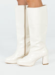 Cream knee high boots Faux glossy leather  Zip fastening at side  Block heel  Rounded toe 