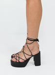 Heels Thin strappy upper  Ankle wrap tie fastening  Platform base  Block heel 