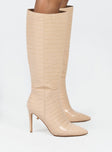 Boots Faux croc leather  Knee-high  Stilleto style heel Pointed toe  Padded inside  Exposed zip on inner side 