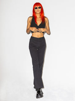 Front view of model wearing  front Princess Polly Sleeveless High Neck  Dain Top Black