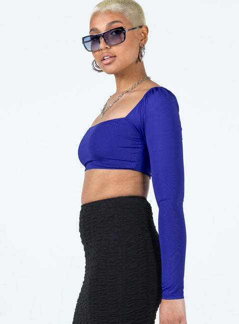 side view of model wearing Princess Polly Rogers Long Sleeve Top Blue Full Sleeves Square Neck 