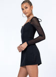 side view of model wearing Princess Polly Charla Mini Dress Black Sweetheart Neckline 