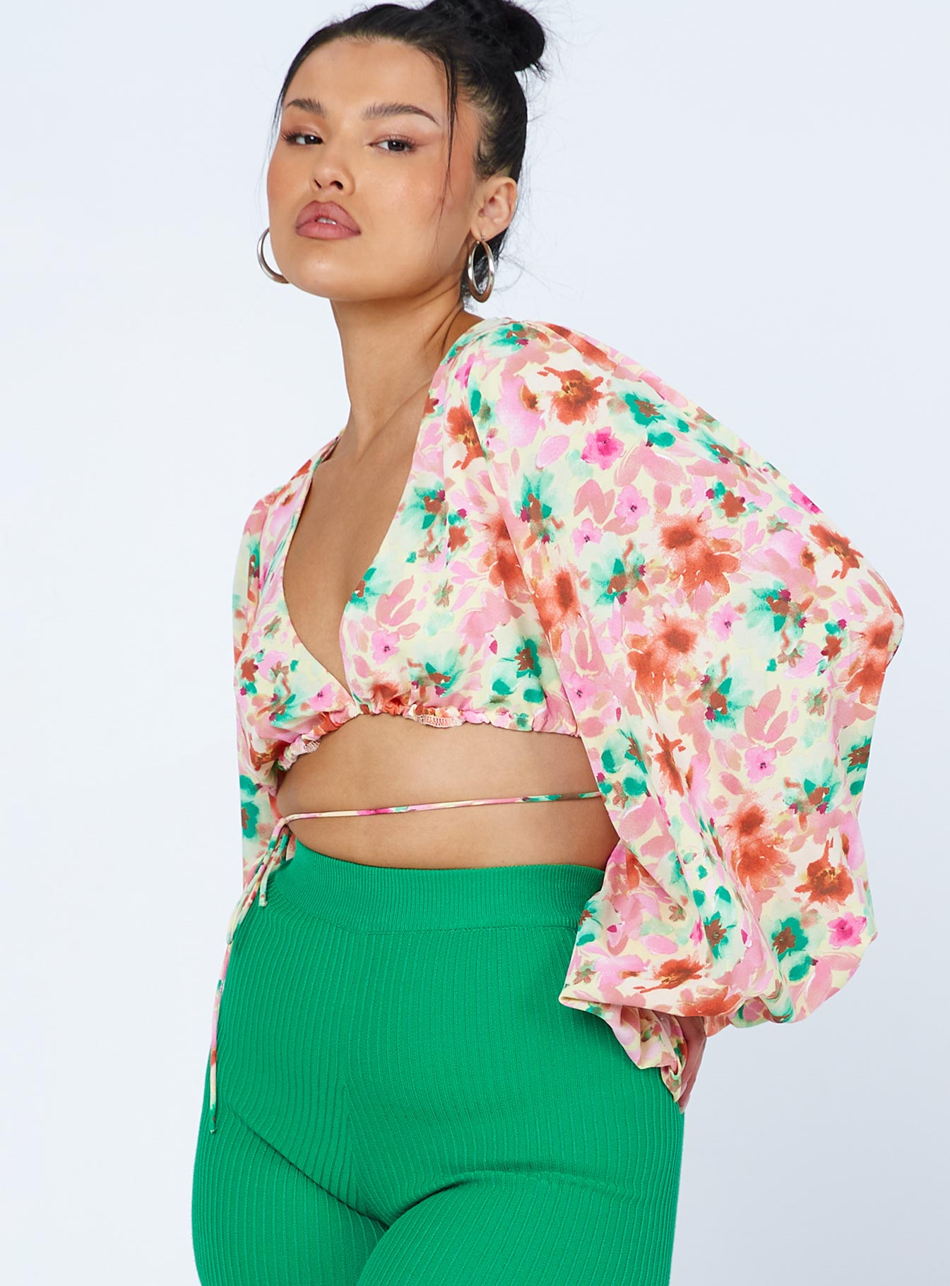 side view of model wearing Princess Polly Antonio Long Sleeve Top Pink Floral 