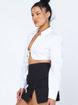 side view of model wearing Princess Polly Myla Long Sleeve Top White 