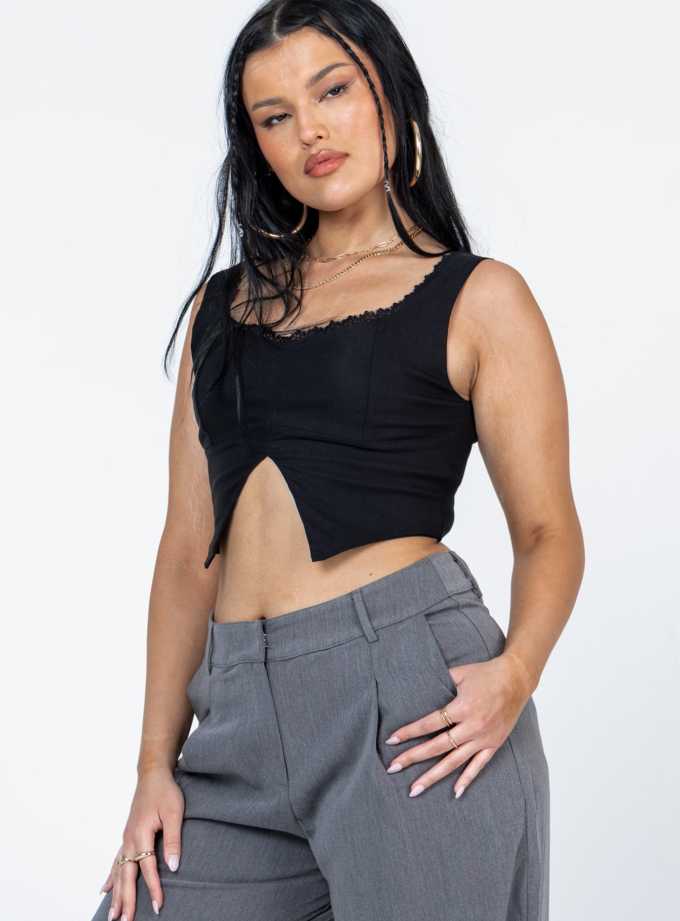 side view of model wearing Princess Polly Auburn Top Black Sleeveless Scoop Neck 