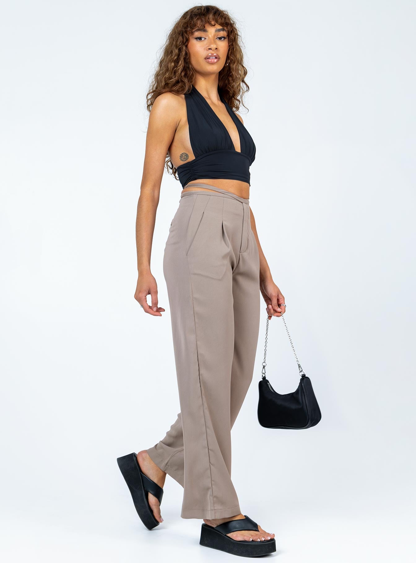 side view of model wearing Princess Polly Rodney Pants Beige 