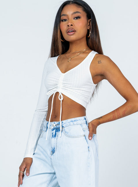 side view of model wearing Princess Polly Harlow Long Sleeve Top White 