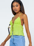 Crop top 100% polyester  Crinkle material  Halter neck tie fastening  Tie fastening at bust  Open front 