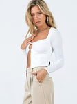 Long sleeve top Textured material  Square neckline Open front design Single button fastening