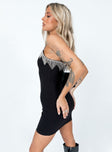 side view of model wearing Princess Polly Jared Mini Dress Black Sweetheart Neckline 